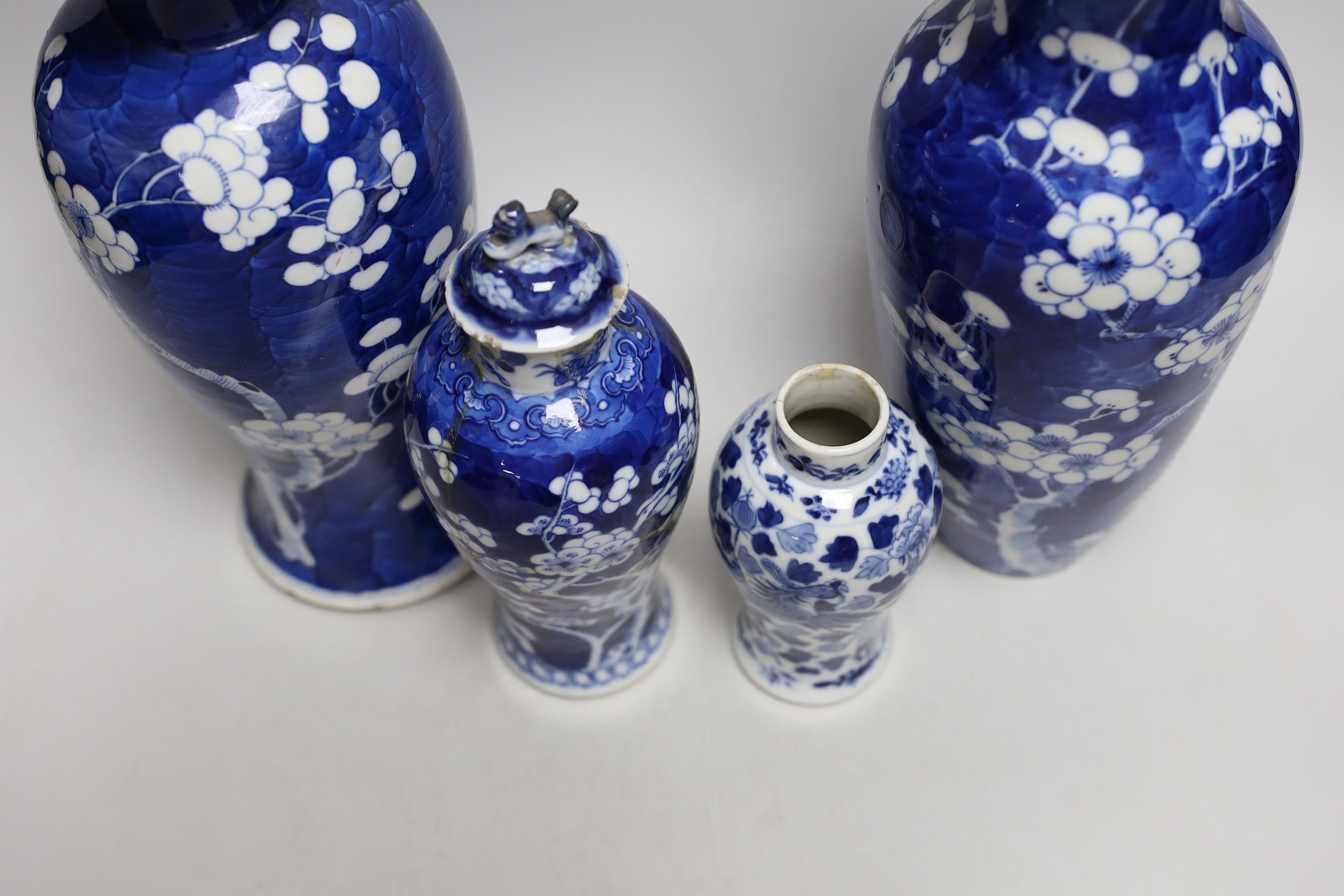 A Chinese prunus baluster jar and cover and three others, similar, tallest 30cms high